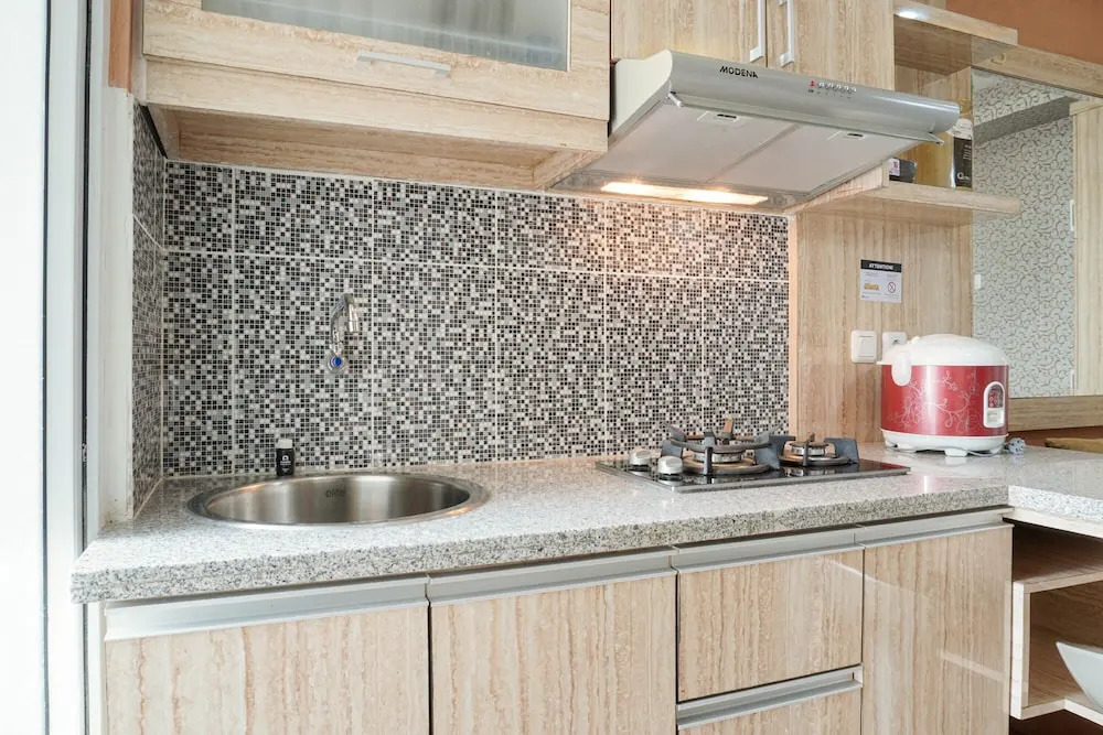 Homey and Fresh 2BR Green Pramuka Apartment