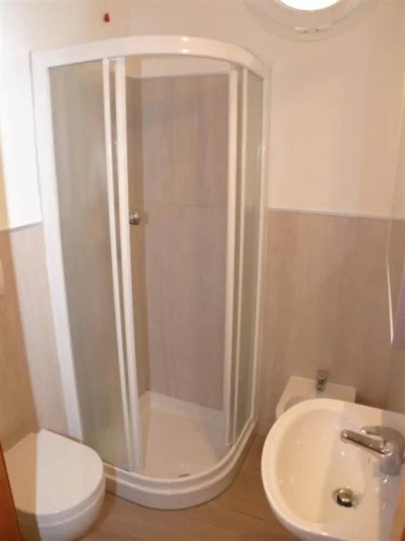 Three-storey Apartment With Shared Pool and Patio