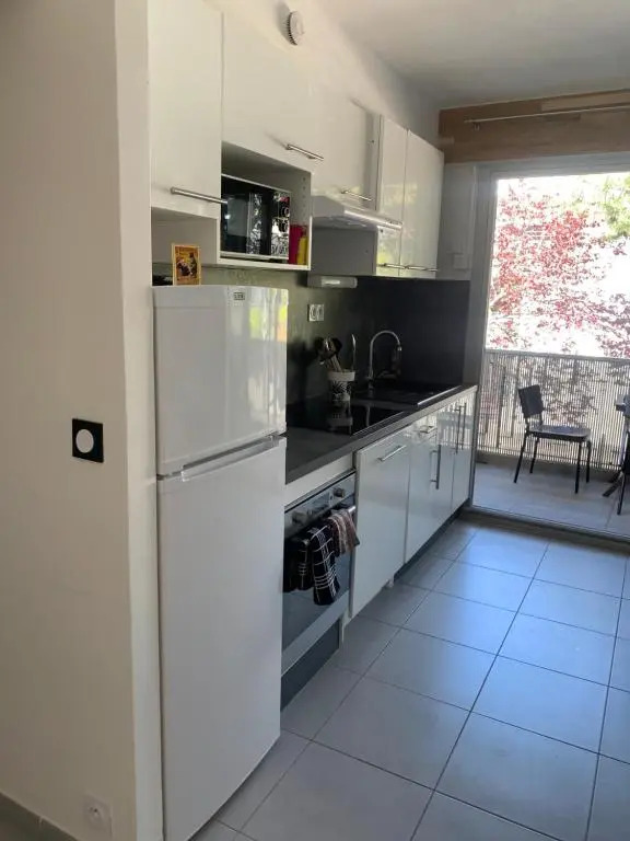 Appartement en résidence climatisé avec parking
