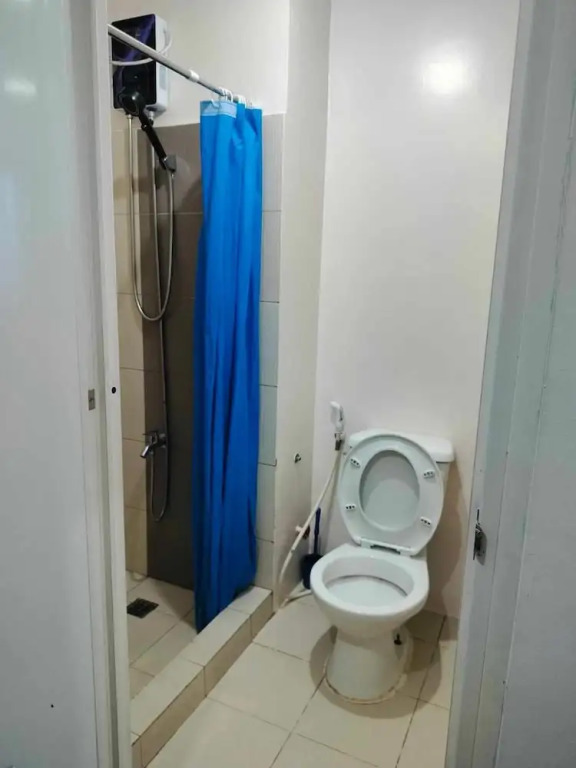 Cozy City View Condo in Quezon City - Your Home Away From Home