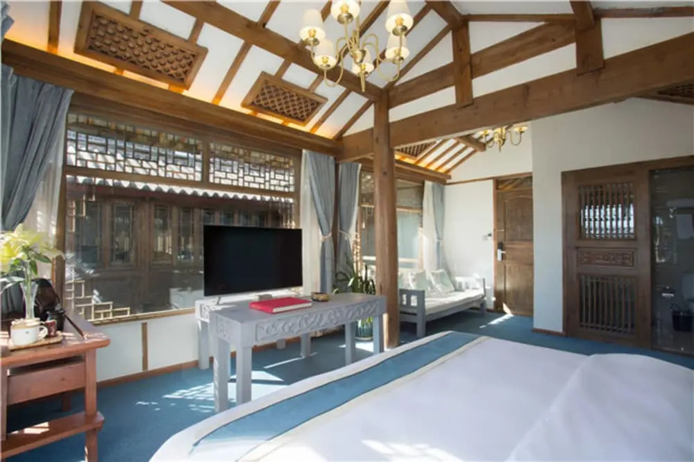 Floral Hotel Lijiang QianlizoudanjiYunju