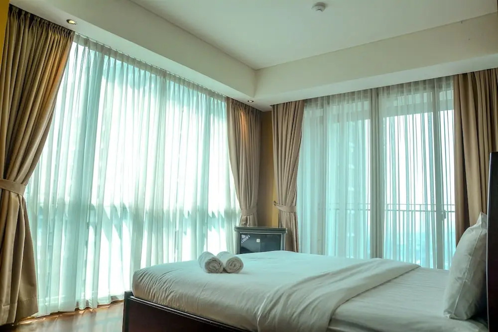 Cozy Pool View Kemang Village Residence Apartment with Direct Access To Mall