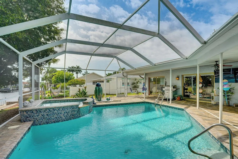 Boat Dock & Pool: Canal-front Cape Coral Gem