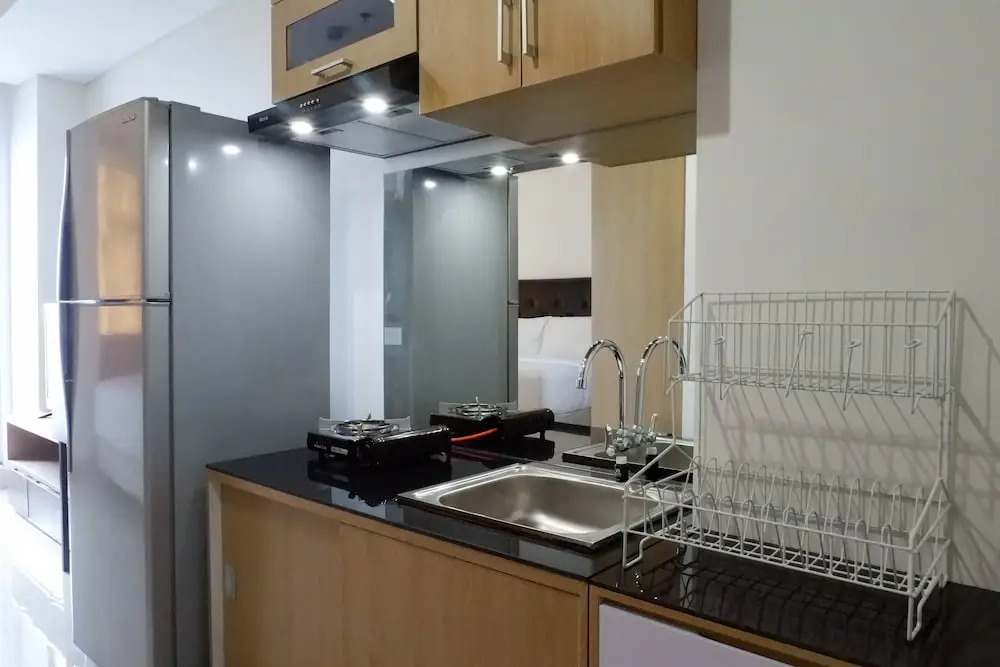 Serene Exclusive Modern Studio Apartment at Grand Sungkono Lagoon By Travelio