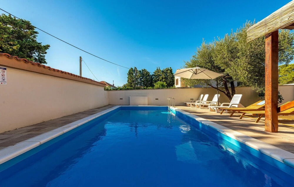 Four-Bedroom Holiday Home In Vrsi