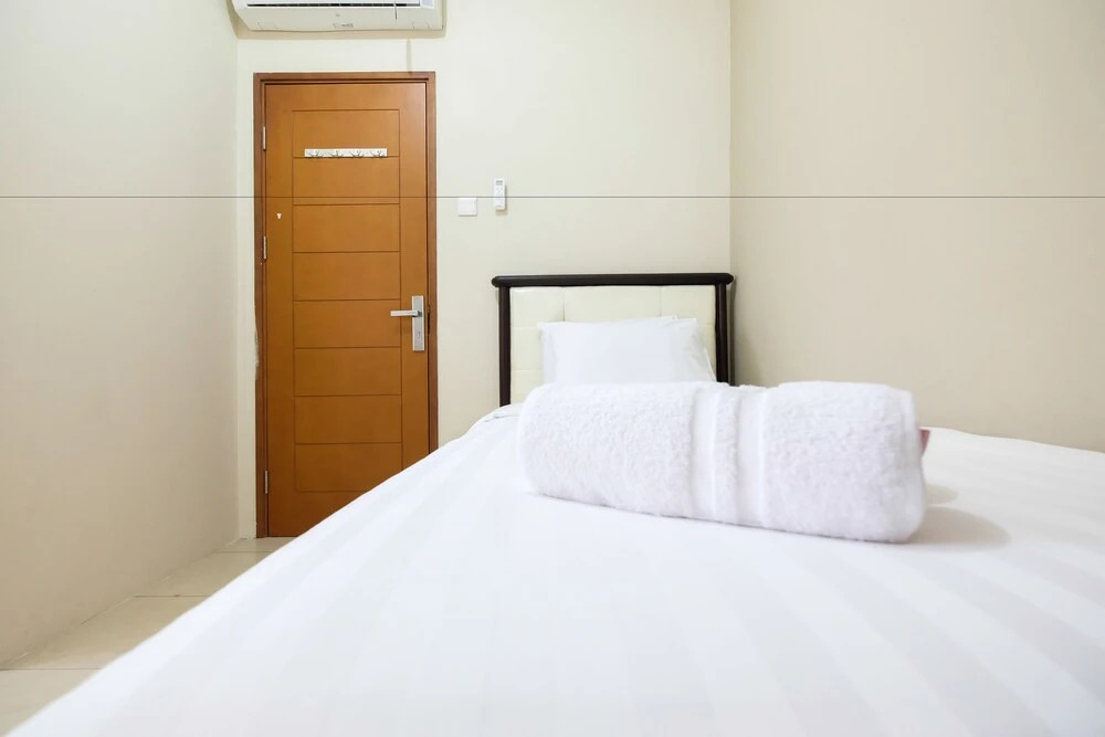 2 Bedrooms at Gading Greenhill Apartment by Travelio