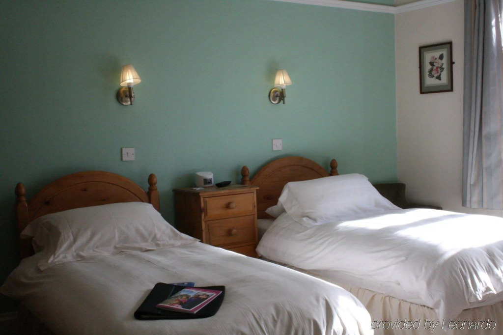 Toothbrush Rooms at Lattice Lodge - Guest Kitchen & EV Recharging