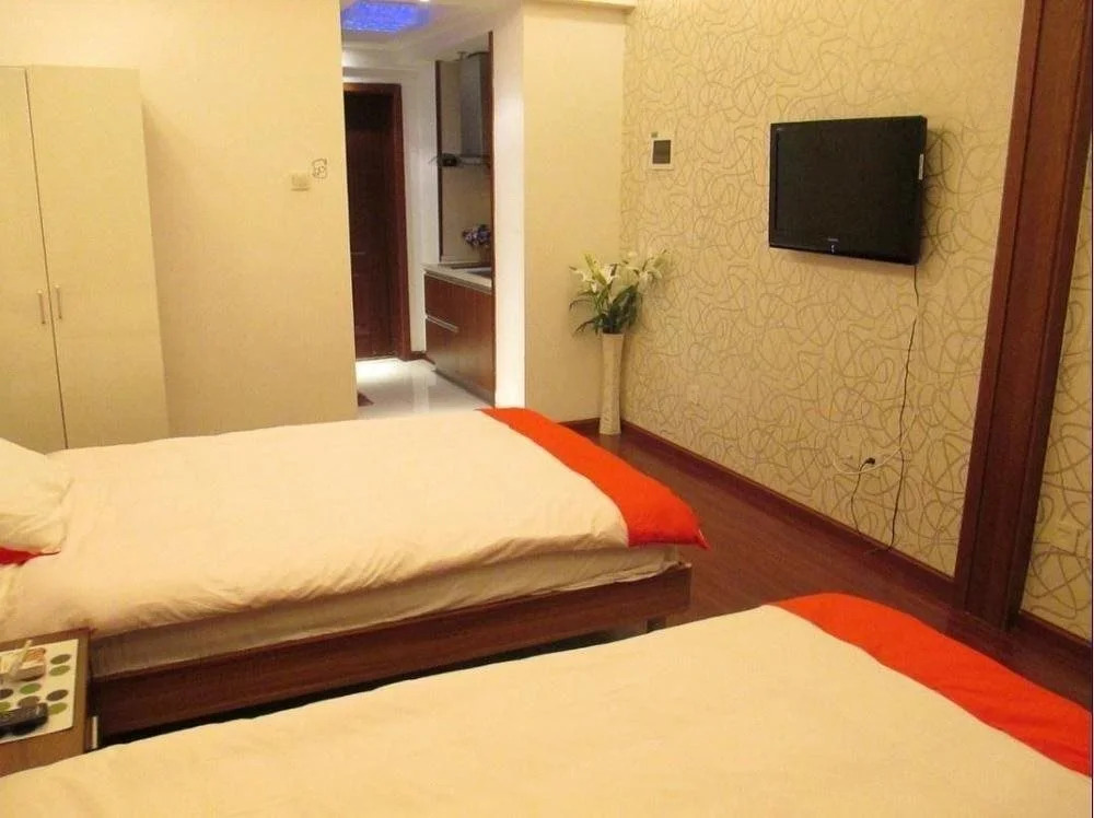 Chengdu Xinyiju Hotel Apartment