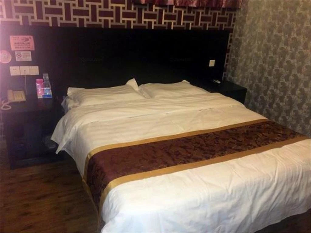 Dushi 118 Hotel Jiaozhou Bus Terminal Branch