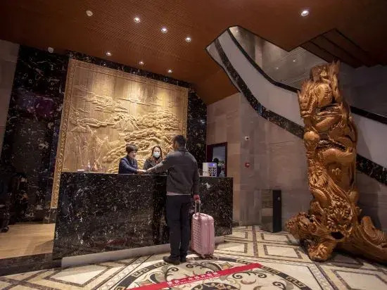 Baiyun Business Hotel (Jianye Railway Station)