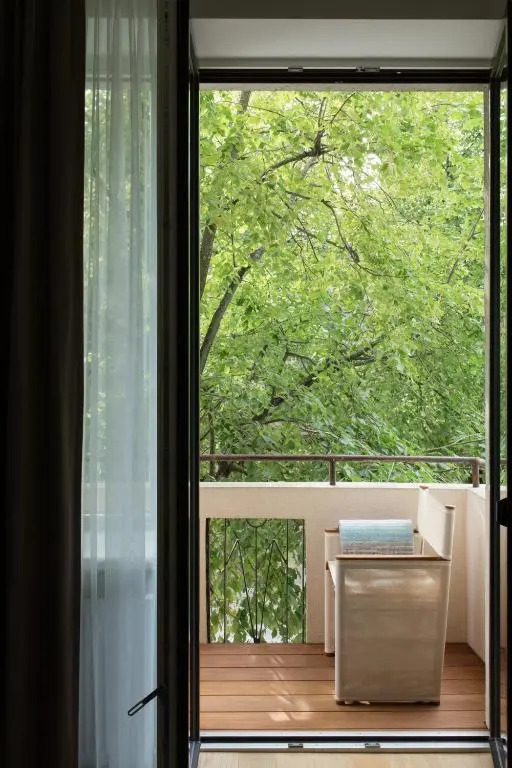 Design Central Studio Apartment with Balcony by Hostlovers