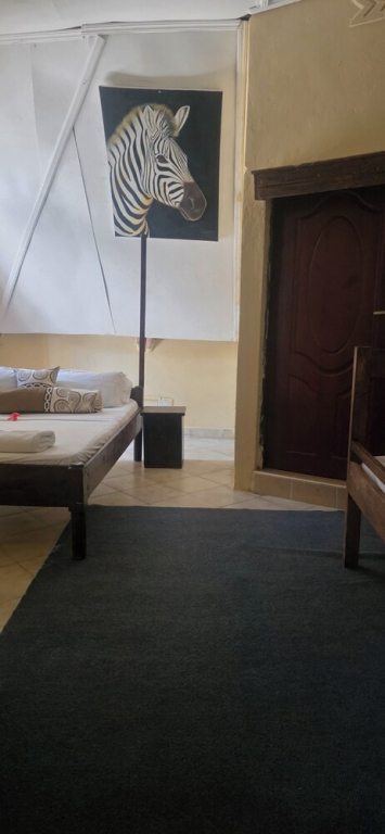 Luxurious 4-bedroom Holiday House With Pool Access in Diani Beach