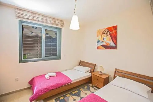 Picture Relaxing Beside Your Private Pool in Protaras Reading Your Favourite Book, Protaras Villa 1320