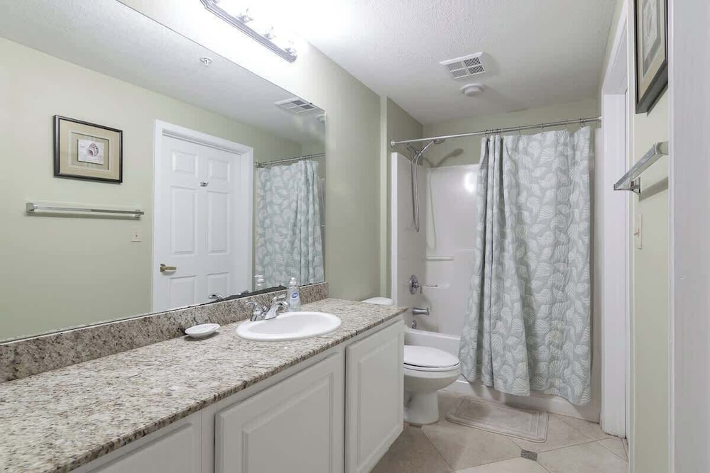 Beachview Condo in Legacy Tower1 -303 - With Reserved Parking Spot in Front