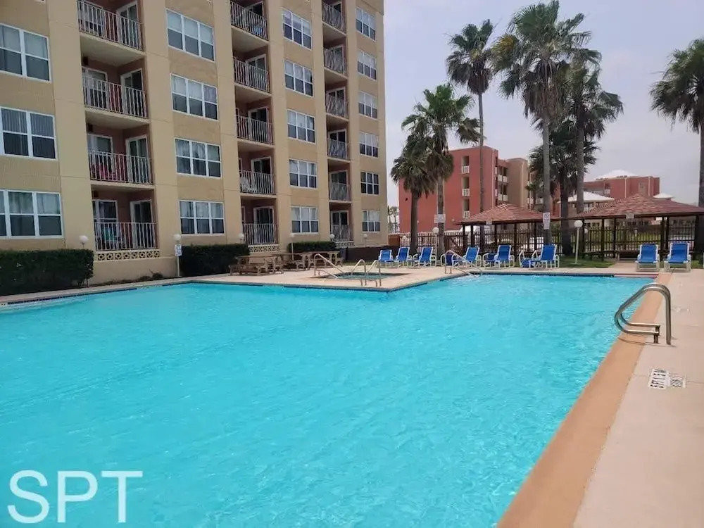 Beach access Condo Nice pool/hot tub area w/bbq 2 Bedroom Home by RedAwning