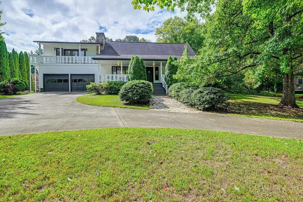 Porch, Yard & Creek Access: Spacious Sylva Home!