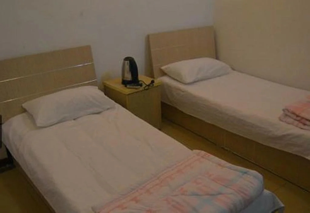 Qingdao Guanglongju Inn