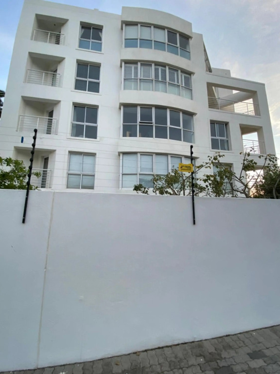 Cozy two bedroom unit in Strand with pool gym and laundromat