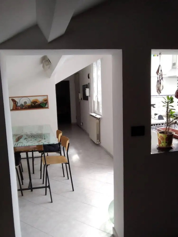 Spacious and Naturally Bright Bomboniera Rooftop Favors Apartment