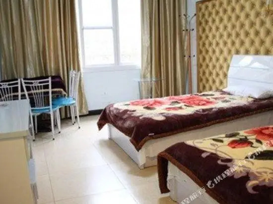 Huanmei Xiangcun Hotel