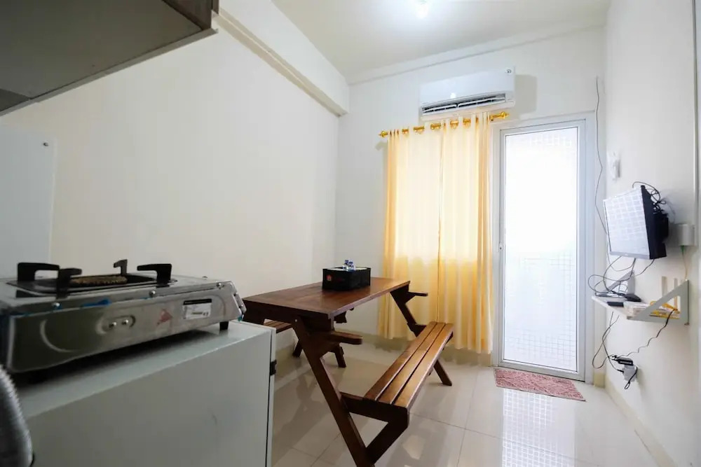 2BR Artistic Room Green Pramuka Apartment closed to Mall By Travelio