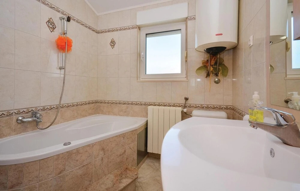 Awesome Home in Kastel Novi with WiFi, 4 Bedrooms & Hot Tub