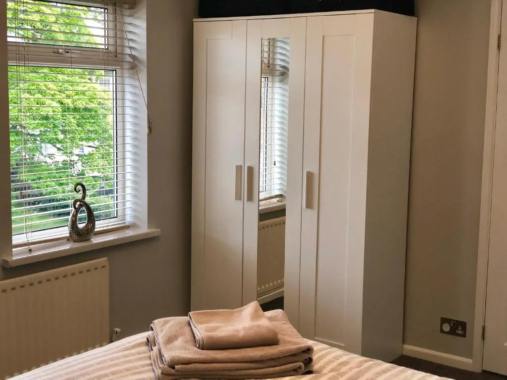 AB - Top floor 2 bed modern town centre apartment with parking for one vehicle