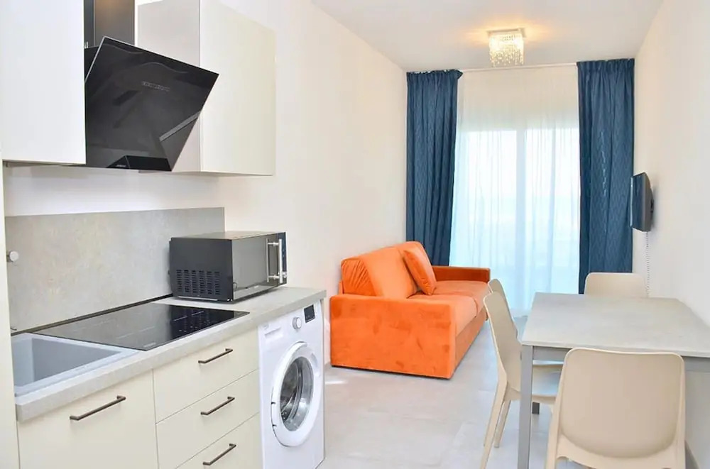 Colourful Suite With Terrace Overlooking the sea