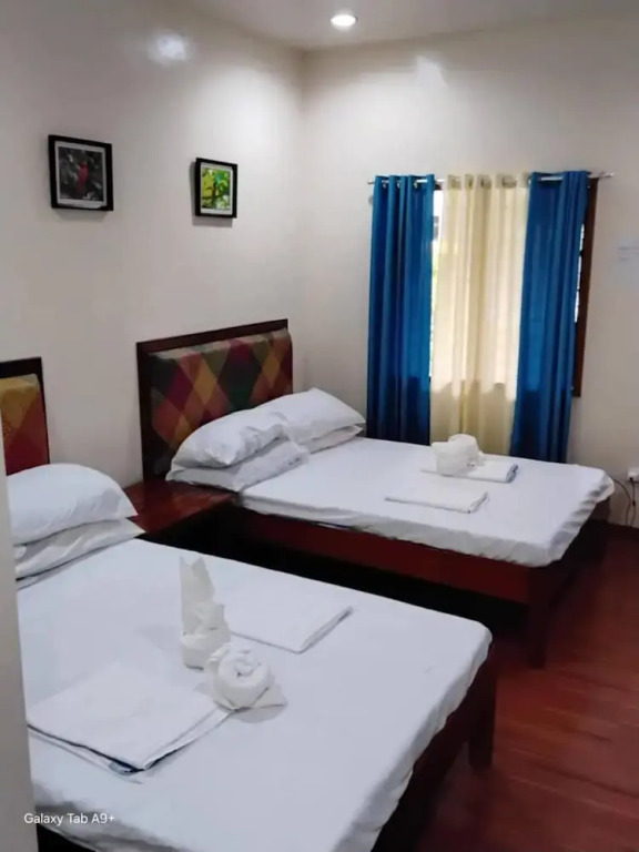 Room-serene Family Haven in Mambajao, Ph