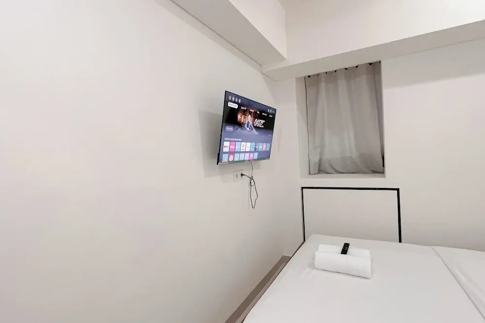 Cozy 1BR (No Kitchen) at Bandaraya - Tallasa City Makassar Apartment By Travelio