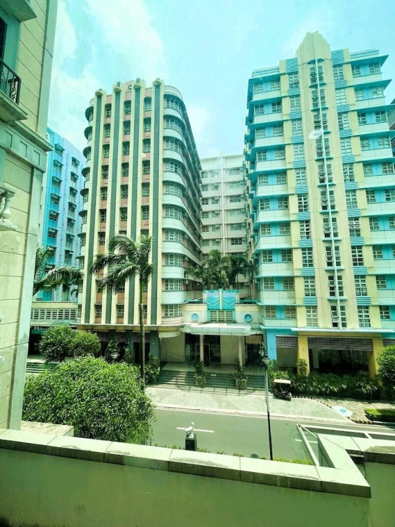Henry & Adiche  Emperador Building