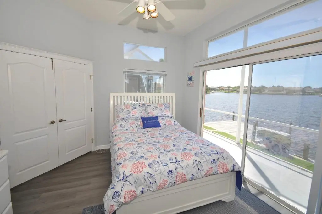 Sunset Bay Beautiful Pool Home - Bring Your Boat or Jet Ski - Canal with Dock- Sleeps 10 - 4 BD