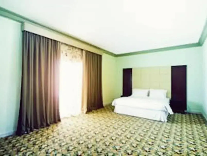 Rose Garden Hotel Suites