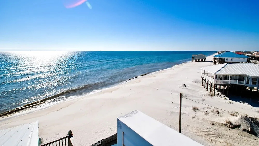 Strand Castle - Gulf Front! An Ideal Layout With Game Room, Small Private Pool, And Roof Top Crow's Nest! 4 Bedroom Home by RedAwning