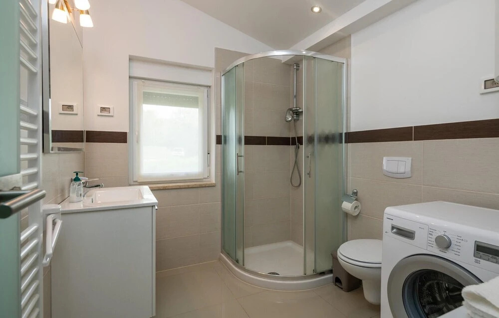 Nice Home in Loborika With Outdoor Swimming Pool, Wifi and 2 Bedrooms