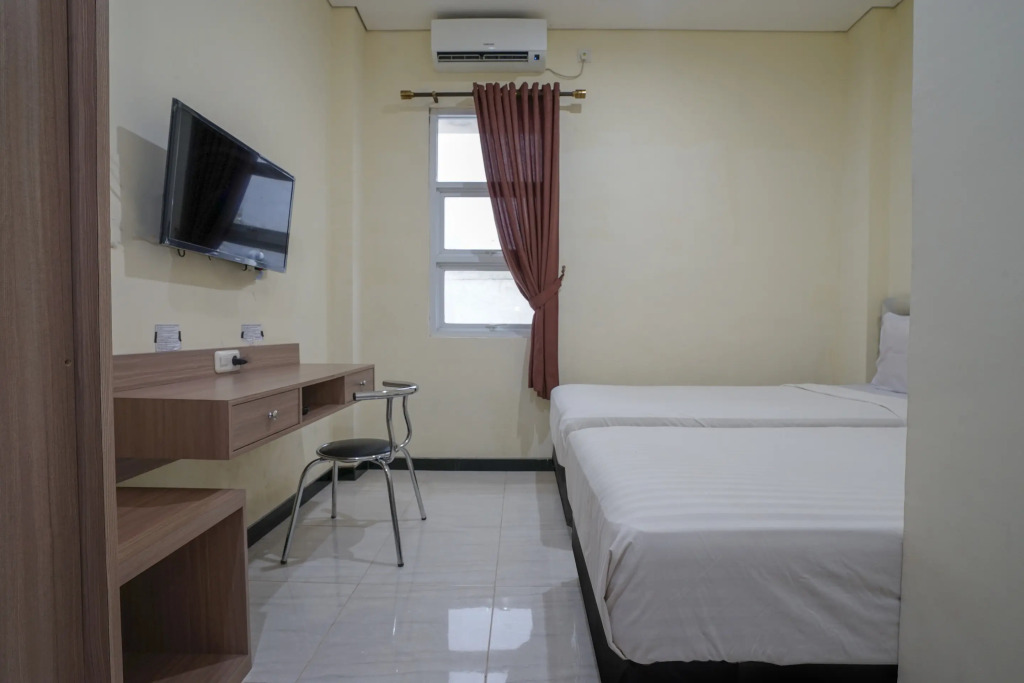 RedDoorz Syariah Near Transmart Mall Palembang