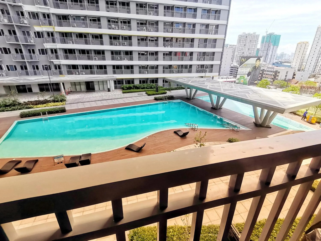 Stylish 1 Bedroom Condo Unit with Perfect Pool View Balcony at Fame Residences