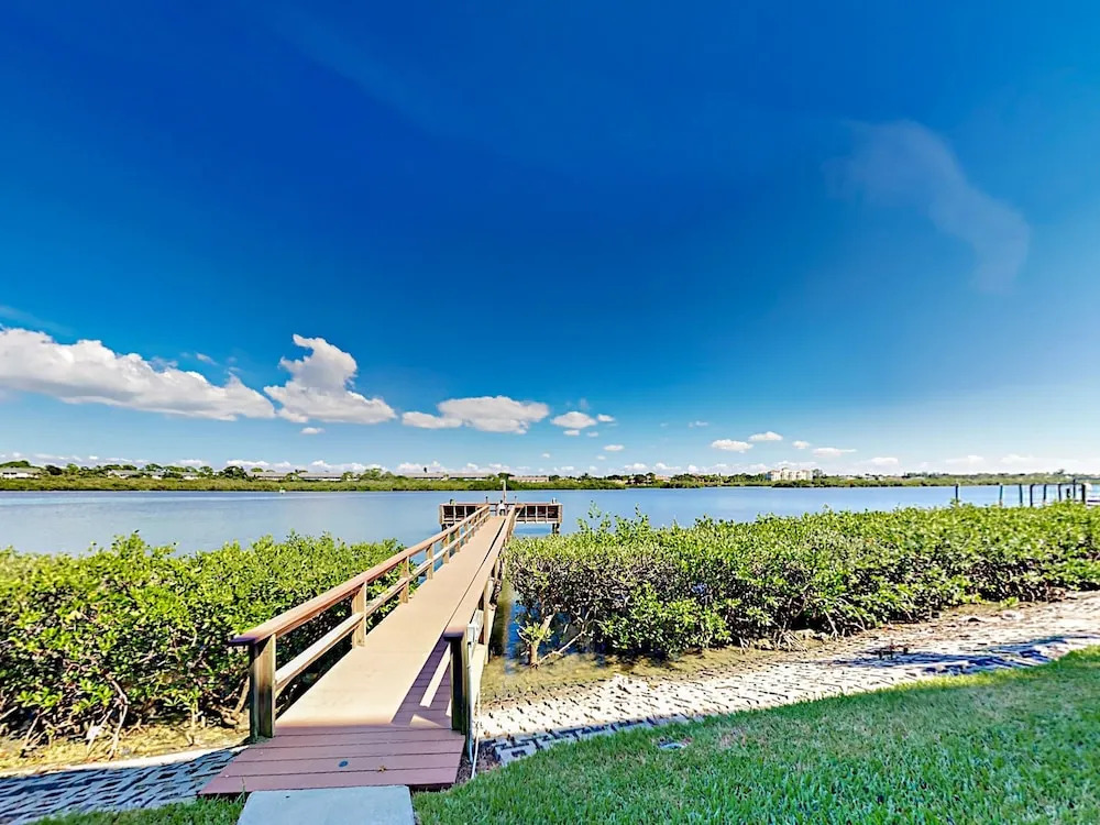 Spot Dolphins from a Private Deck by RedAwning