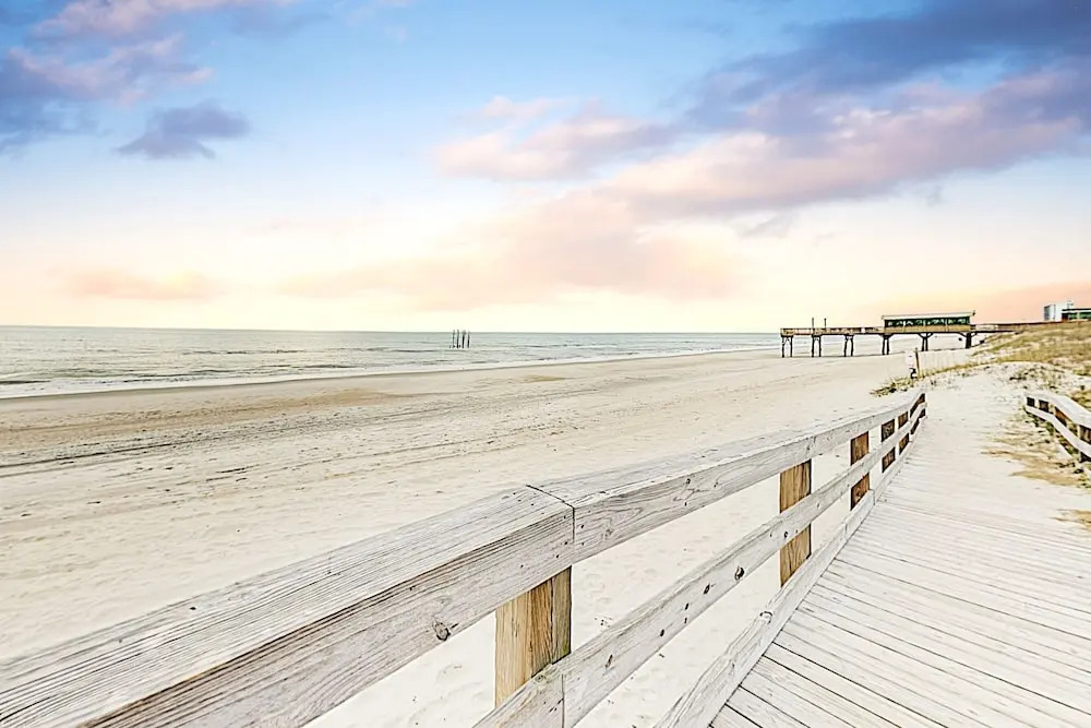 New Listing! Coastal Gem W/ Balconies, Near Beach 4 Bedroom Duplex