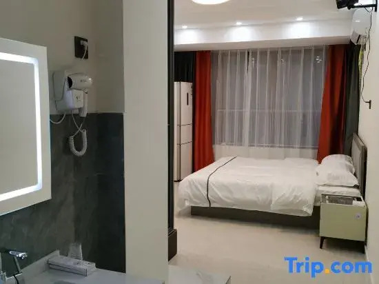 Yanji Songzi Apartment (Yanbian University Network Red Wall Shop)