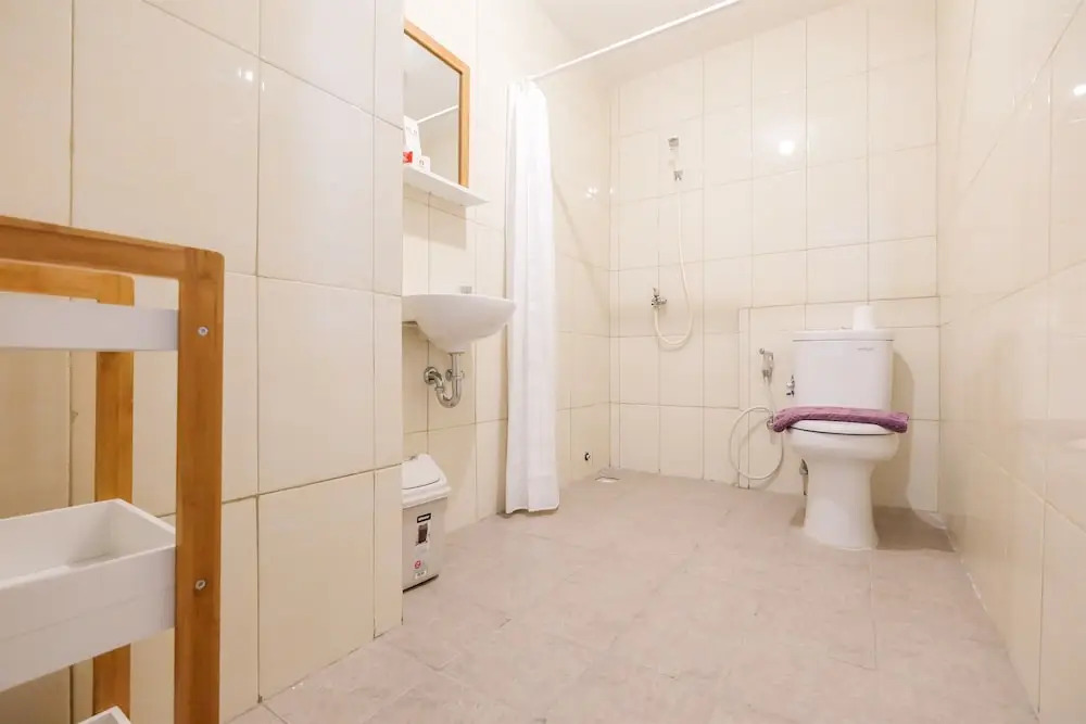 Spacious 2 Bedroom at Bassura City Apartment By Travelio
