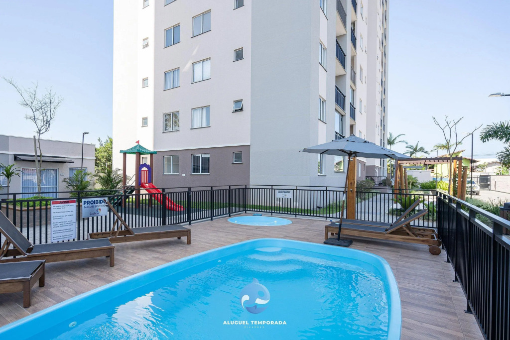 Apartamentos a150M DA PRAIA com SACADA, WI-FI, PISCINA, PORTARIA 24h, PLAYGROUND e vaga de GARAGEM