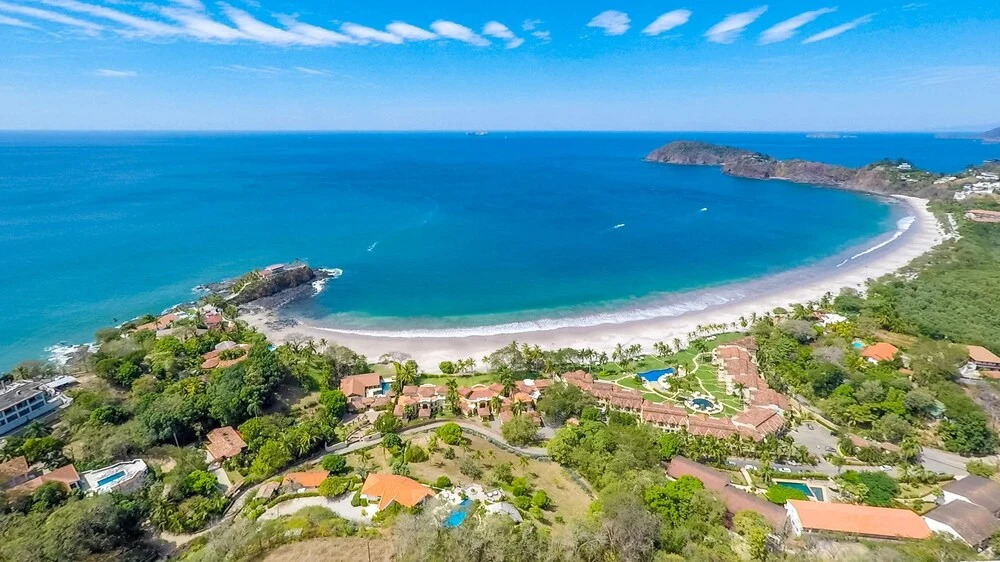 Elegant Mediterranean-Style Mansion with Beachfront Views and Private Infinity Pool