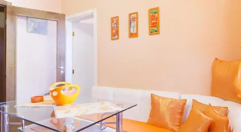 Orange Flower Apartments