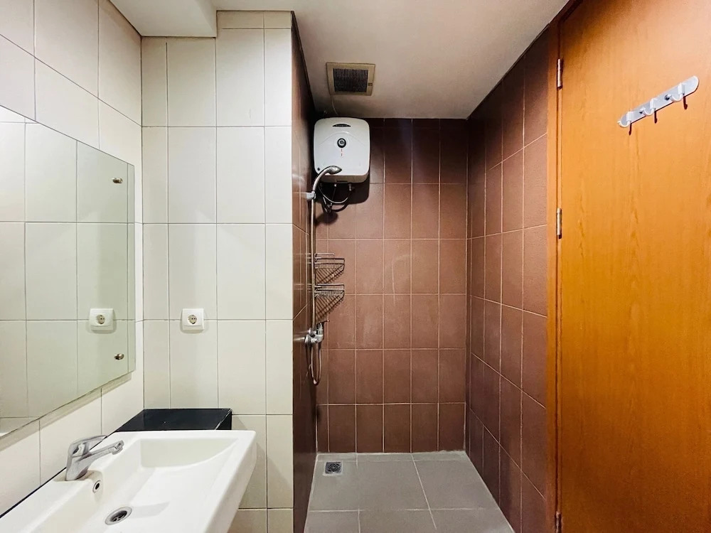 Cozy and Serene Studio Dago Suites Apartment By Travelio