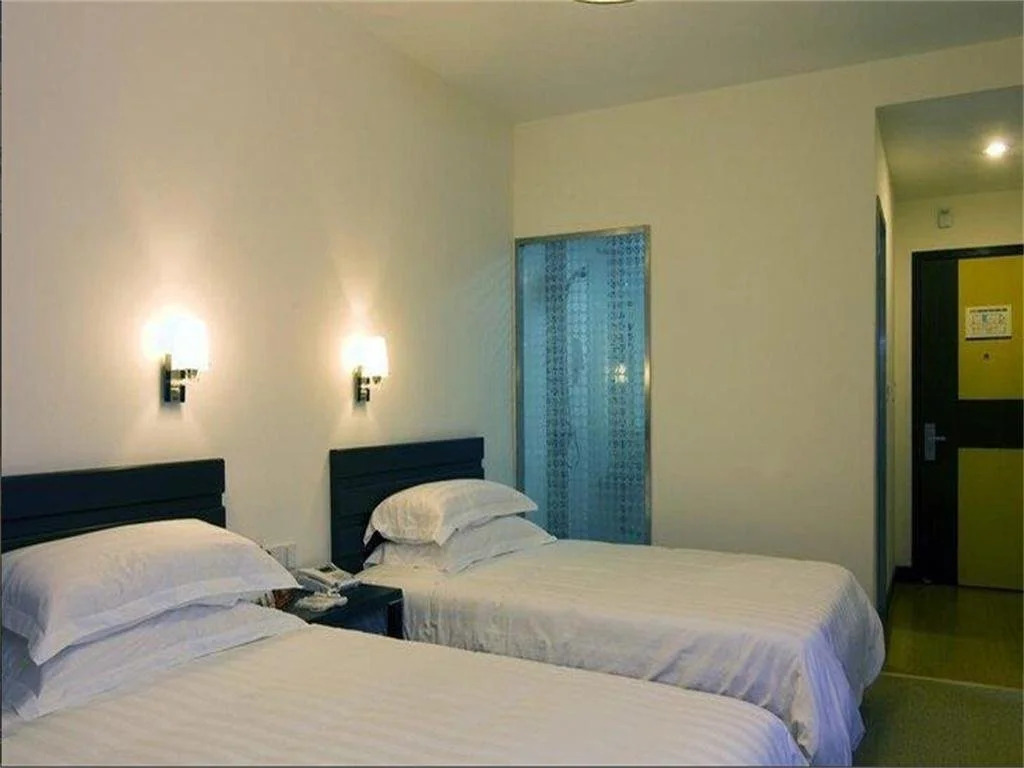 Pinghu Nine Dragon Business Hotel