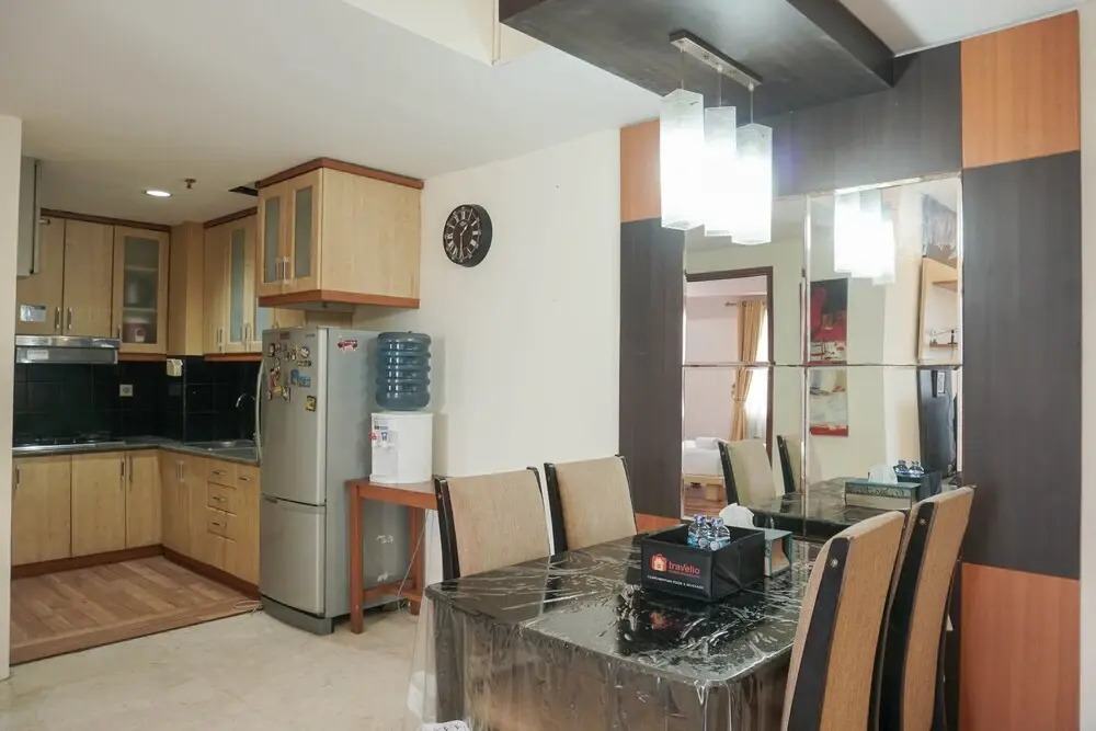 Homey and Modern with City View 2BR Poins Square Apartment