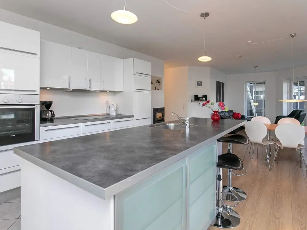 8 person holiday home on a holiday park in Bogense