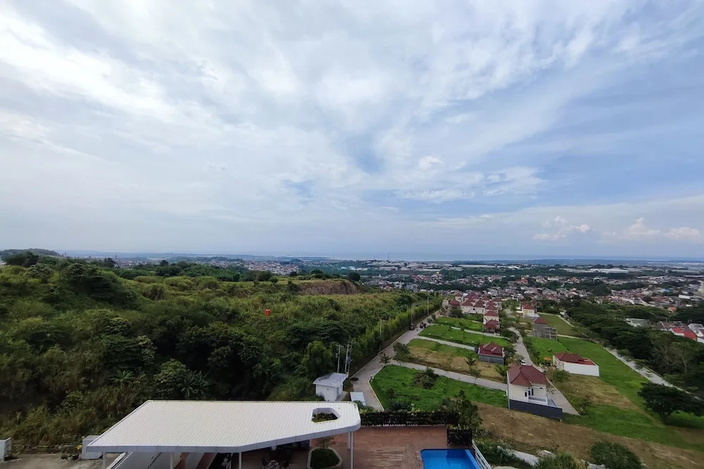 Homey 1BR without Living Room at Amartha View Apartment By Travelio