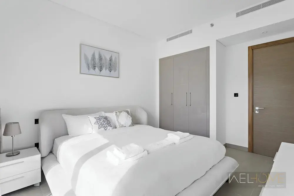 WelHome - Charming Apt With City Lights in Sobha Waves